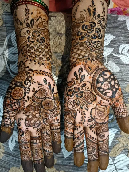 A full view of a mixed-style design, combining intricate florals, paisleys, and geometric fills for a rich and varied look.