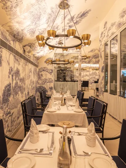 Our indoor dining room offers a more formal setting for important conversations. It's ideal for corporate dinners or large family gatherings where you need space and elegance.