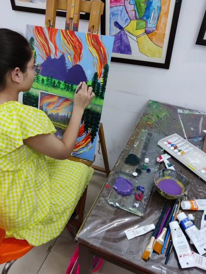 Follow a student's progress on a vibrant landscape painting, showing the development from a simple sketch to a fully colored and detailed scene.