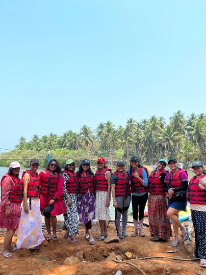 Our group posing near the water, ready for a day of kayaking and boating.