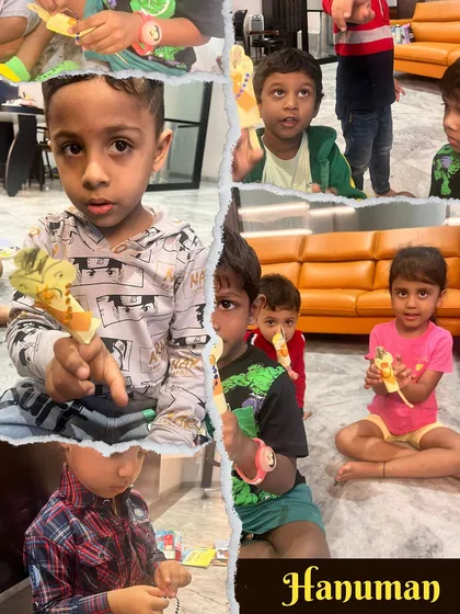 Crafting Hanuman puppets! The children are excited to show the puppets they made. This activity not only enhances fine motor skills but also allows them to use the puppets for their own storytelling later.