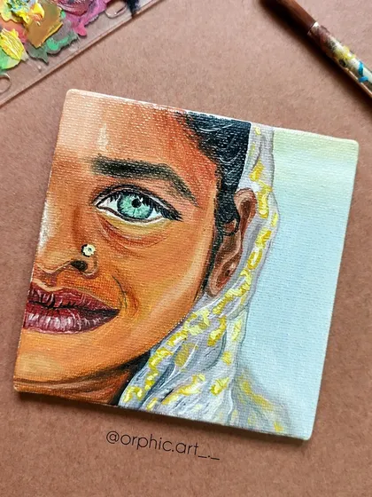 This was my very first portrait using oil on canvas. It's a painting of a woman with striking green eyes, and it marks the beginning of my journey and love for this medium.