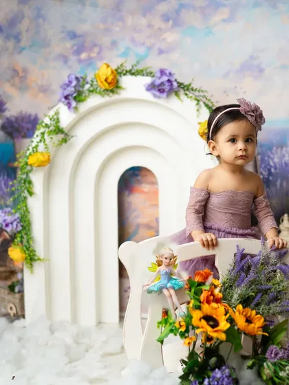 A curious glance from a little one during her lavender-themed session. I love capturing the different moods and expressions of babies.