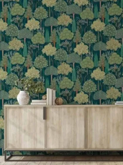 This is the kind of transformation I love to see. A high-quality botanical wallpaper from my collection turns a simple wall into a sophisticated and serene feature. This design, with its detailed trees on a deep teal background, is perfect for living rooms or bedrooms.