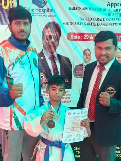 With our gold medalist from the Sub-junior District Karate Championship. This victory secured his selection for the state level competition.