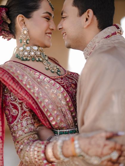 A close-up filled with smiles and affection. The genuine connection between Khushi and Deepak shines through in this beautiful portrait.