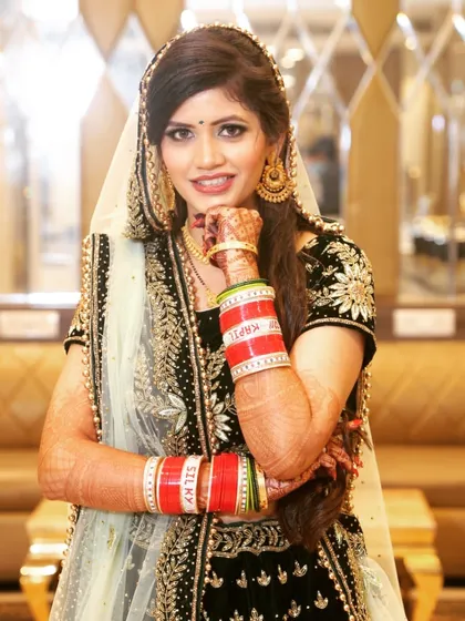 For her reception, we went with a glamorous look that was both traditional and modern. The makeup was designed to last through the night of celebrations while looking flawless in photos.