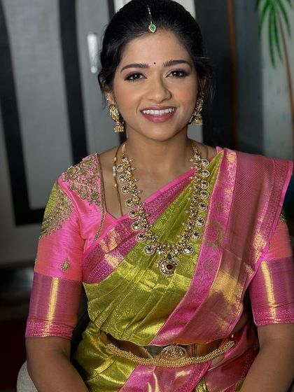 Rishika's smile and beautiful saree make for a perfect portrait of happiness.