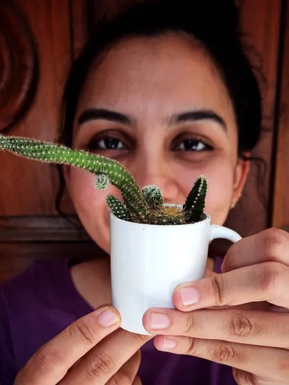 A full smile with my tiny cactus friend. Using unconventional planters like this small mug is a fun way to get creative with your indoor plants.