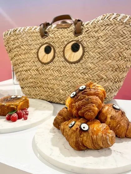 Playful croissants with googly eyes, inspired by Anya Hindmarch's iconic designs. This is a perfect example of how we infuse a sense of humor and brand personality into our food.