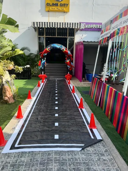The runway entrance for our airplane-themed party, complete with traffic cones and a custom arch.