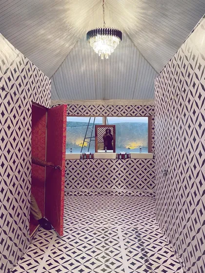 Who says a washroom can't be a design moment? In the middle of the Thar desert, we built this fully functional and stylish washroom with endless views of the dunes. For us, luxury and guest comfort extend to every single detail, no matter the location.