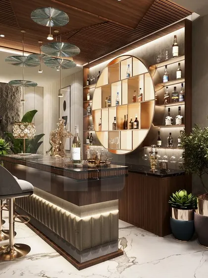 For clients who love to host, a private bar is the ultimate expression of personal style. I designed this space with a custom-lit circular shelf, a textured bar counter, and elegant seating to create a sophisticated lounge atmosphere right at home.