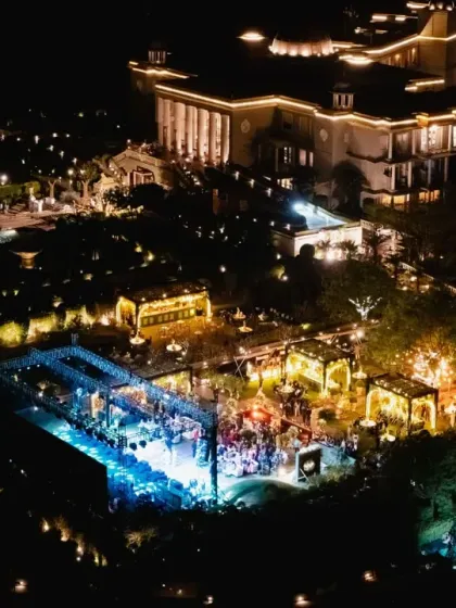 From an aerial perspective, you can see how I orchestrate the entire event landscape. This view of a welcome dinner shows the meticulous planning of guest flow, lighting design, and different zones for dining and entertainment.