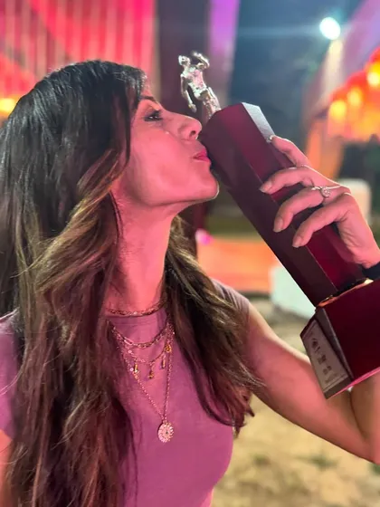 Kissing a trophy. This is a celebration of the journey, of turning my passion into my profession. The best is yet to come.
