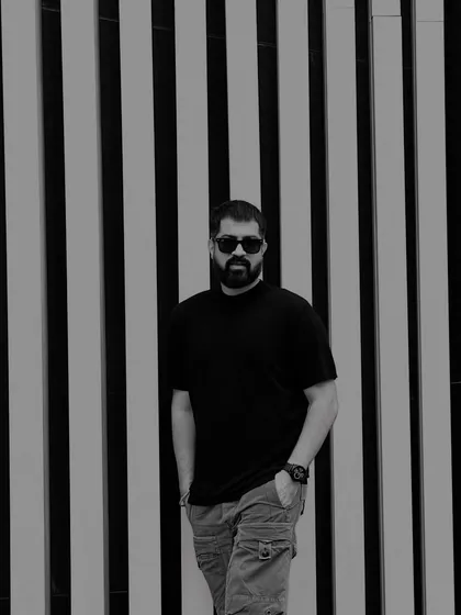 A simple, confident pose. My personal style is an extension of my artistic expression.
