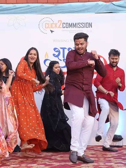 It's not a successful event until the team hits the dance floor. I arrange for entertainment that gets everyone involved, like this high-energy performance at the Click2Commission annual Diwali bash.