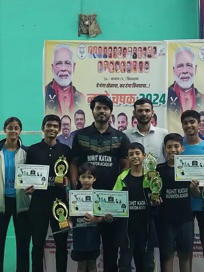 Victory is a team effort. Here's a look at our players with their well-earned trophies after a successful tournament. At our academy, we celebrate every win as a family.