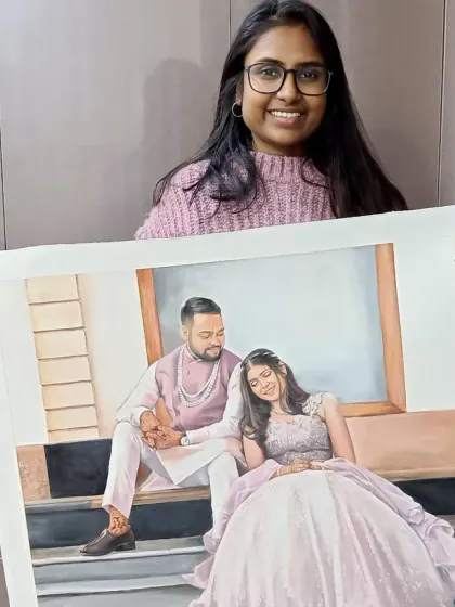 Me holding the large, un-stretched canvas of this romantic couple's portrait.