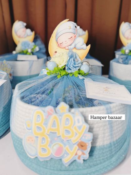 These woven rope baskets are a popular and reusable option for our baby announcement hampers.