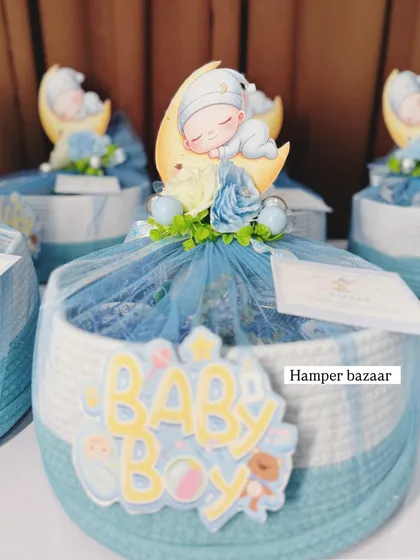 These woven rope baskets are a popular and reusable option for our baby announcement hampers.