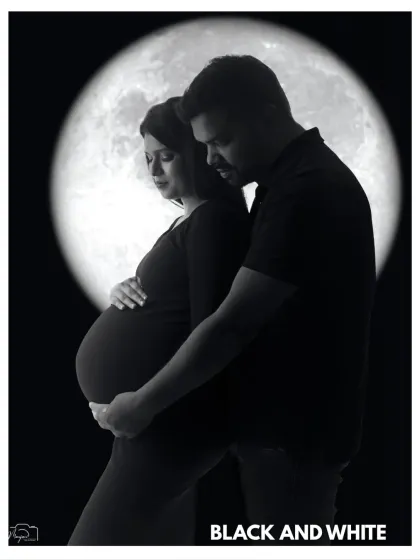 Sometimes, stripping away color reveals the most powerful emotions. My black and white portraits focus on the raw connection, the beautiful silhouette of your bump, and the profound love story unfolding in the quiet moments.