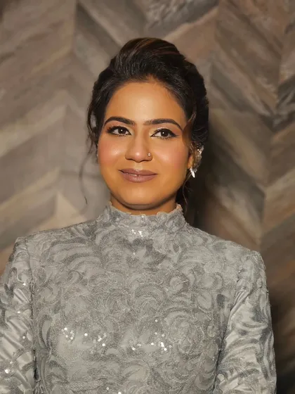 A portrait of our engaged bride. The makeup features a soft smokey eye and a nude lip, exuding pure elegance.
