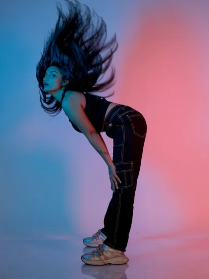 Capturing motion with a hair flip. Our strobe lights are perfect for freezing action and creating dynamic, high-energy fashion portraits.