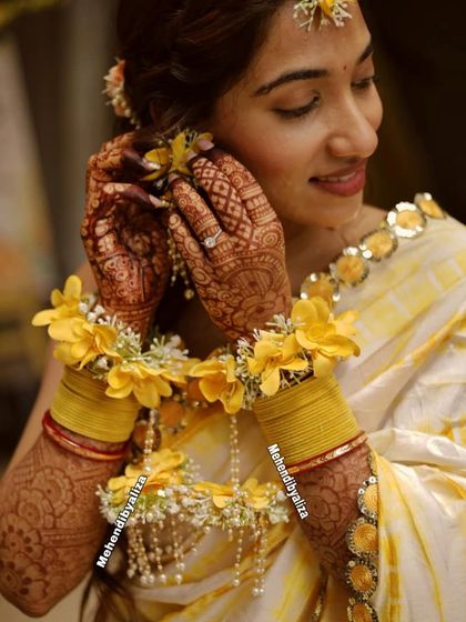 Intricate Bridal & Engagement Henna photo 30