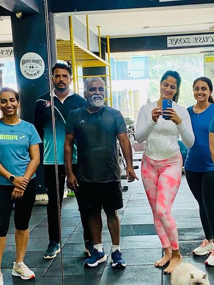 A happy group shot with members of all ages. Fitness is a lifelong journey, and everyone is welcome here.