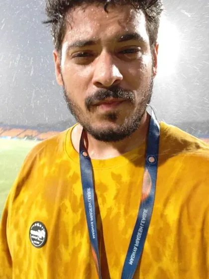 Getting caught in the rain while shooting in Gwalior. As a sports photographer, I am prepared to work in any weather to capture the full story of the day.
