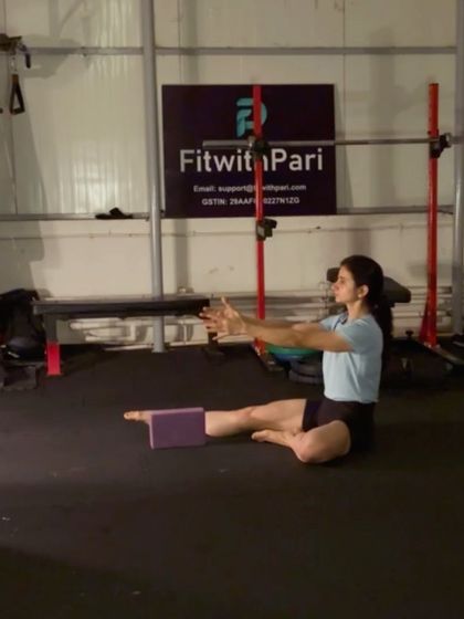 A seated single-leg extension. This move helps to improve hamstring flexibility and control.