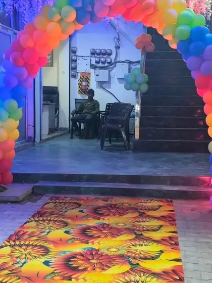 A massive rainbow balloon arch makes for a grand entrance to this Cocomelon themed birthday party. It's the perfect way to welcome guests and get them excited for the celebration inside.