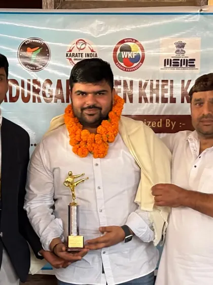 Honoring a guest at the Bahadurgarh Open Khel Karate Championship. We value everyone who supports the growth of sports in our community.
