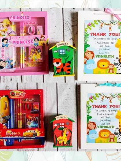 This hamper combines a jungle-themed piggy bank with a choice of character stationery sets, all packed in a personalized jungle paper bag.