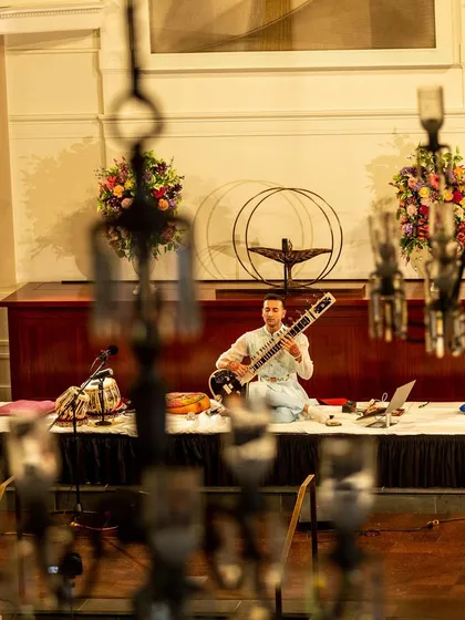 A view from the chandeliers at All Souls NYC. This was a special night celebrating my 25th birthday with over 550 attendees, blending meditative ragas with my original compositions.