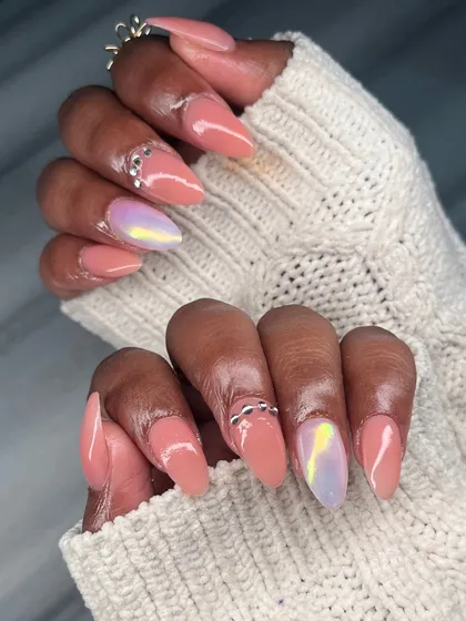 Another angle of the peach and chrome manicure, showing how the different elements come together for a look that is both soft and glamorous.