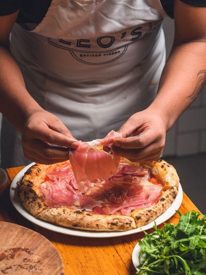 Indulge in the elegance of our Prosciutto di Parma Neapolitan pizza, where premium, aged prosciutto meets a classic Italian base.