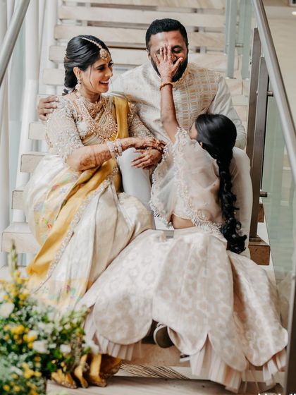 A playful, candid moment from my baby shower. My daughter's joy is infectious as we celebrate together in our matching outfits.