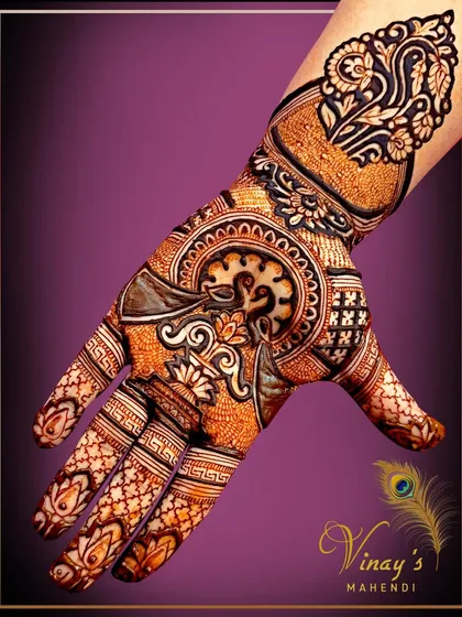 A rich and detailed single-hand design, perfect for a close family member. It features a swan and lotus surrounded by intricate patterns.