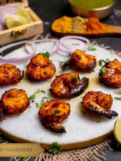 Another beautiful presentation of our Prawns Tandoori, showcasing the fresh ingredients and spices we use to create this popular dish.