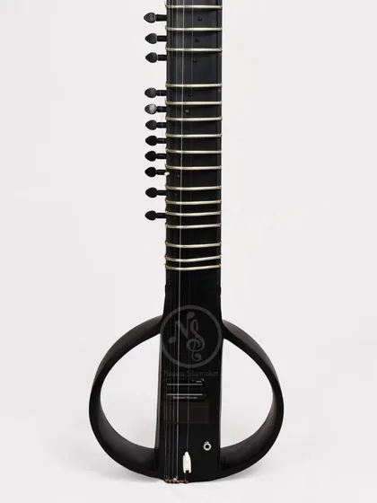 A full-length view of the black electric sitar. It's a modern instrument rooted in classical tradition.