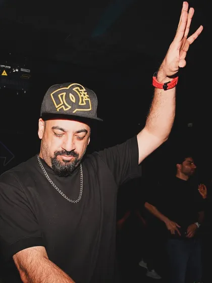 In the zone, with my hand up, feeling the music at ICY Dubai.