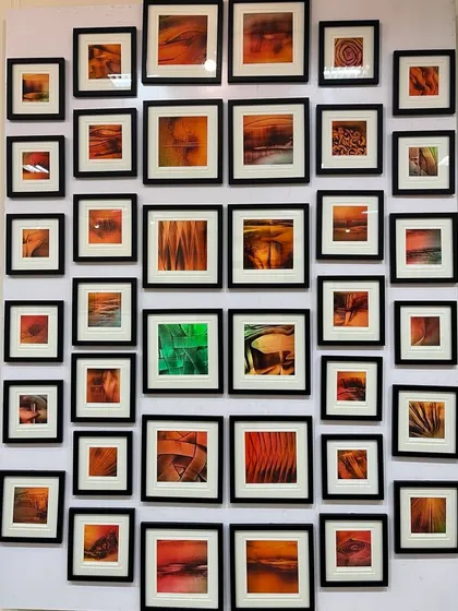 A glimpse of my 'Sand Fusion' collection displayed at a gallery. Seeing my work framed and arranged like this shows how a series of smaller pieces can create a large, impactful statement wall.
