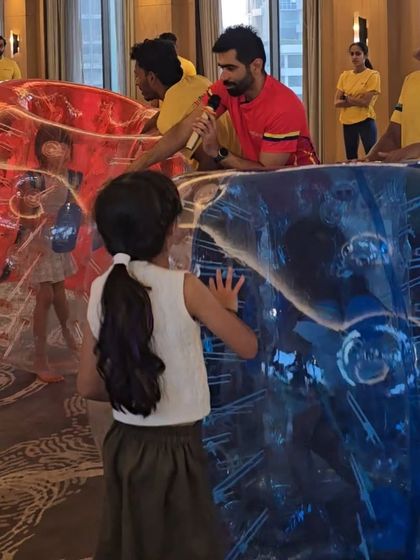 Getting ready for a Zorb ball showdown. Our coaches explain the rules and ensure everyone is safely strapped in before the bumping and rolling begins.