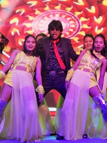A close-up of the dynamic choreography from our Goa show. The energy and precision of my dancers are a key part of our appeal.