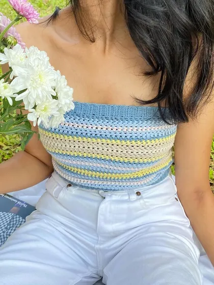 A close-up of the handmade tube top, showing the texture of the crochet stitches. You can choose any color combination you like.