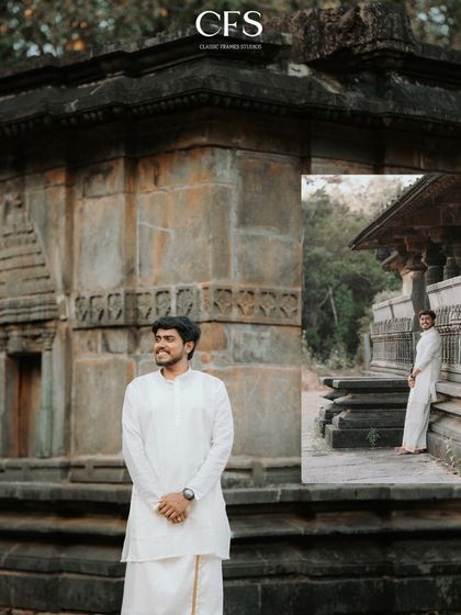 A groom's portrait in traditional white kurta and veshti, exuding quiet confidence and elegance against the backdrop of ancient temple carvings.
