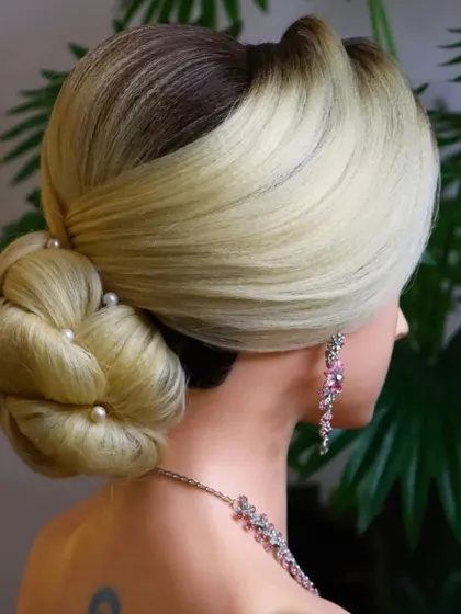 Another view of the knot bun hairstyle, showcasing the clean lines and beautiful shape. The two-tone hair color really makes the details of the knotwork pop.