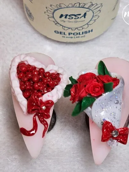 The quality of our NSSA gel polish and 3D carving gels is evident in this detailed Valentine's art. The colors are rich, and the gels hold their shape perfectly for intricate sculptures like this heart and rose bouquet.